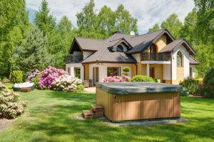 Covered hot tub in backyard