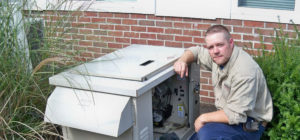 Converse Electric technician working on residential generator