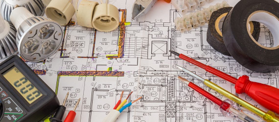 Still Life Of Electrical Components Arranged On Plans